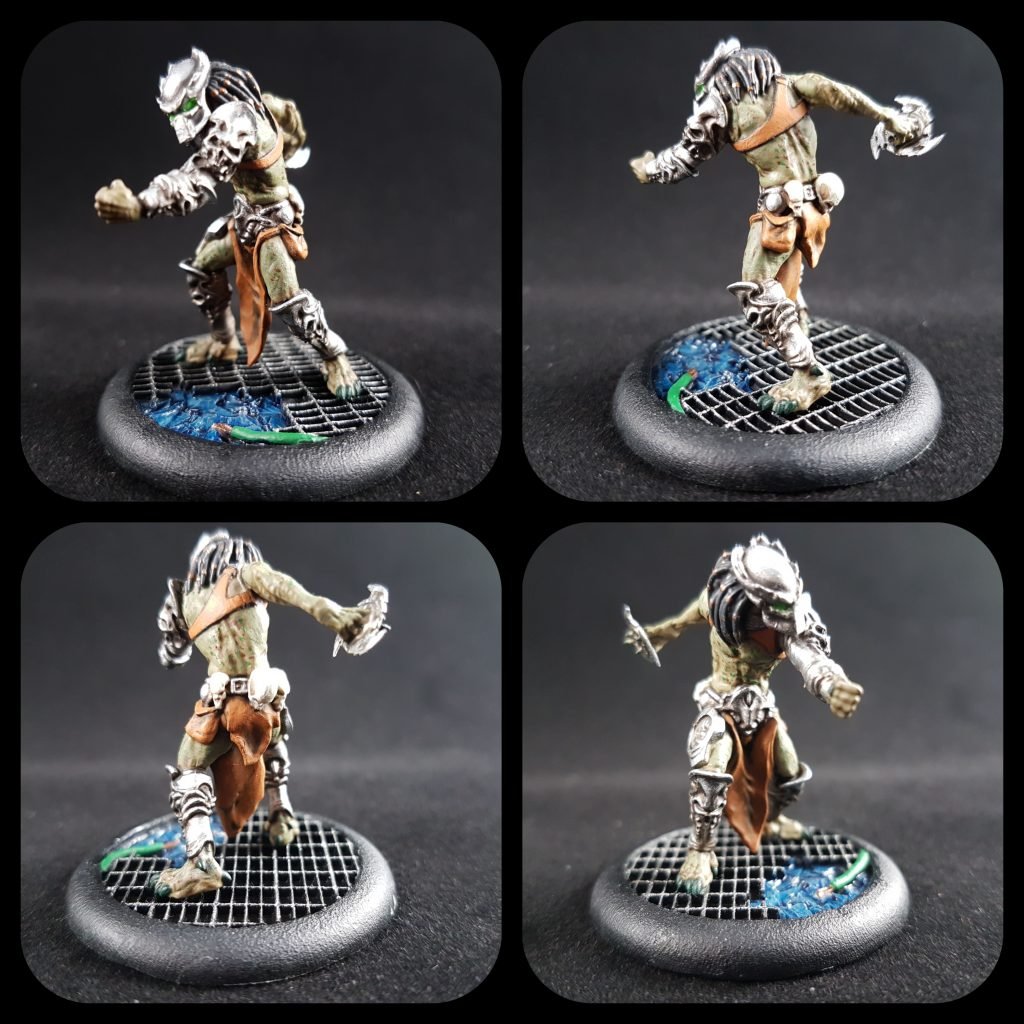 four photos of painted Disc Predator model